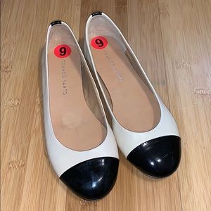 Beige and black flats